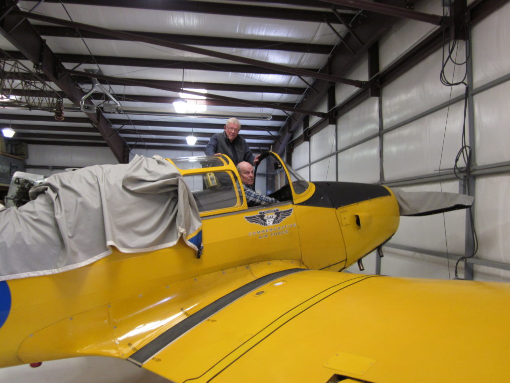 Checking out the cockpit of the PT-26